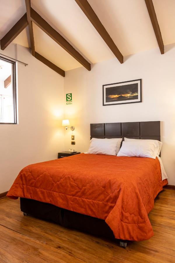 Hostal & Apartments El Triunfo Cuzco Buitenkant foto