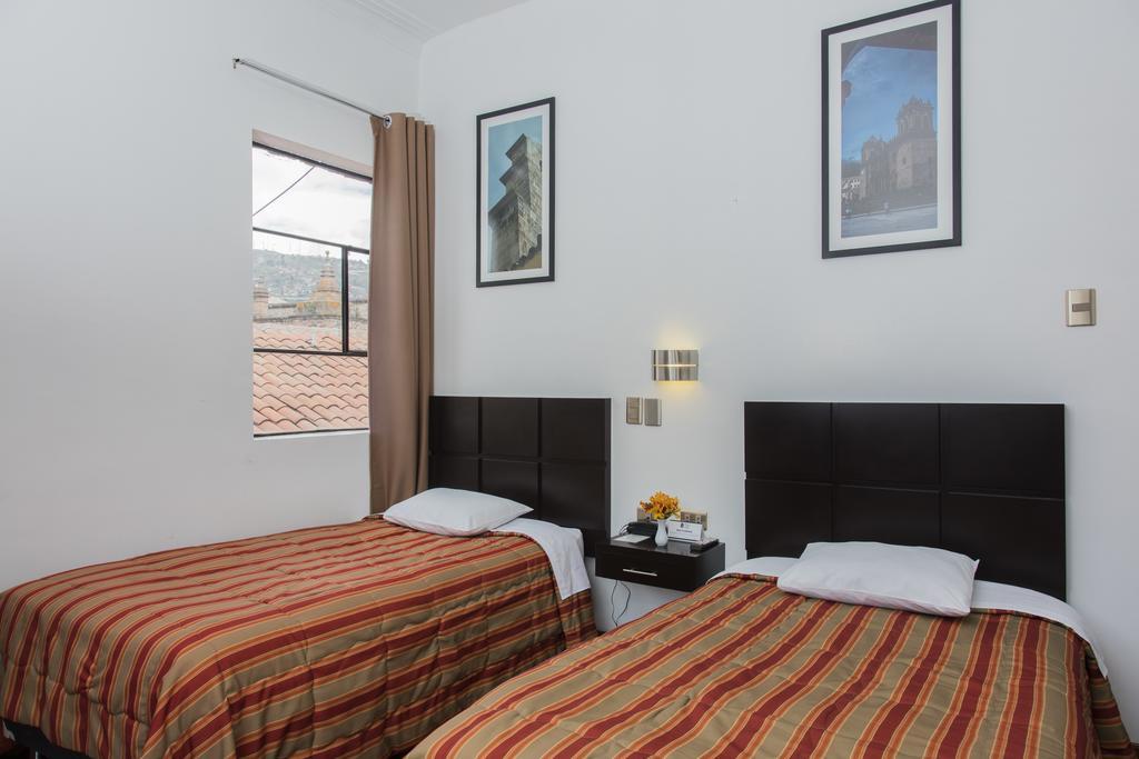 Hostal & Apartments El Triunfo Cuzco Buitenkant foto