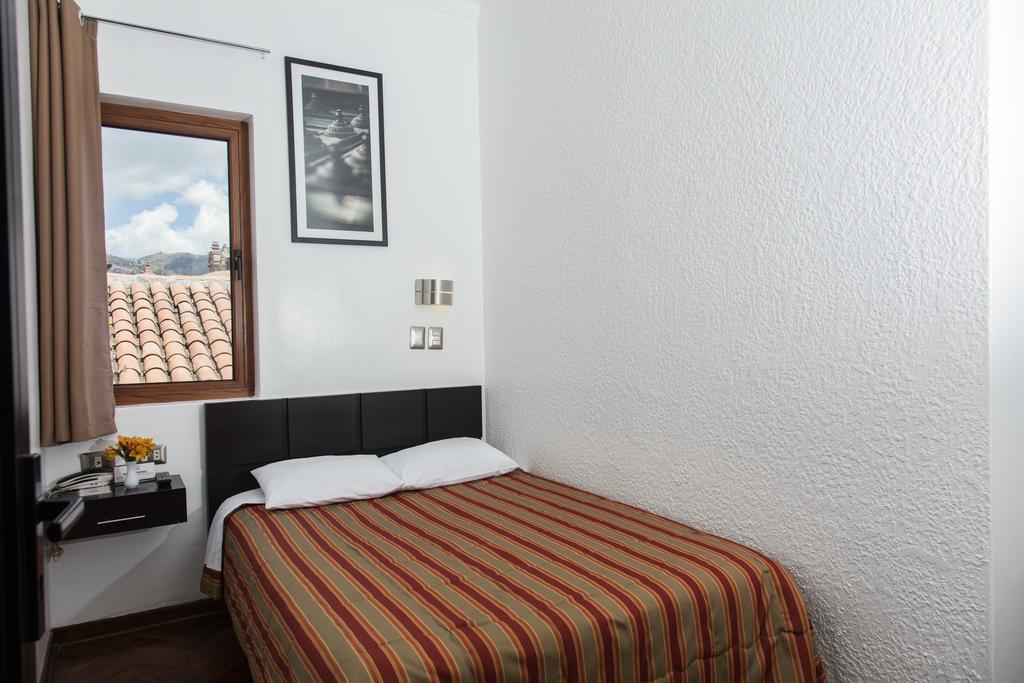 Hostal & Apartments El Triunfo Cuzco Buitenkant foto