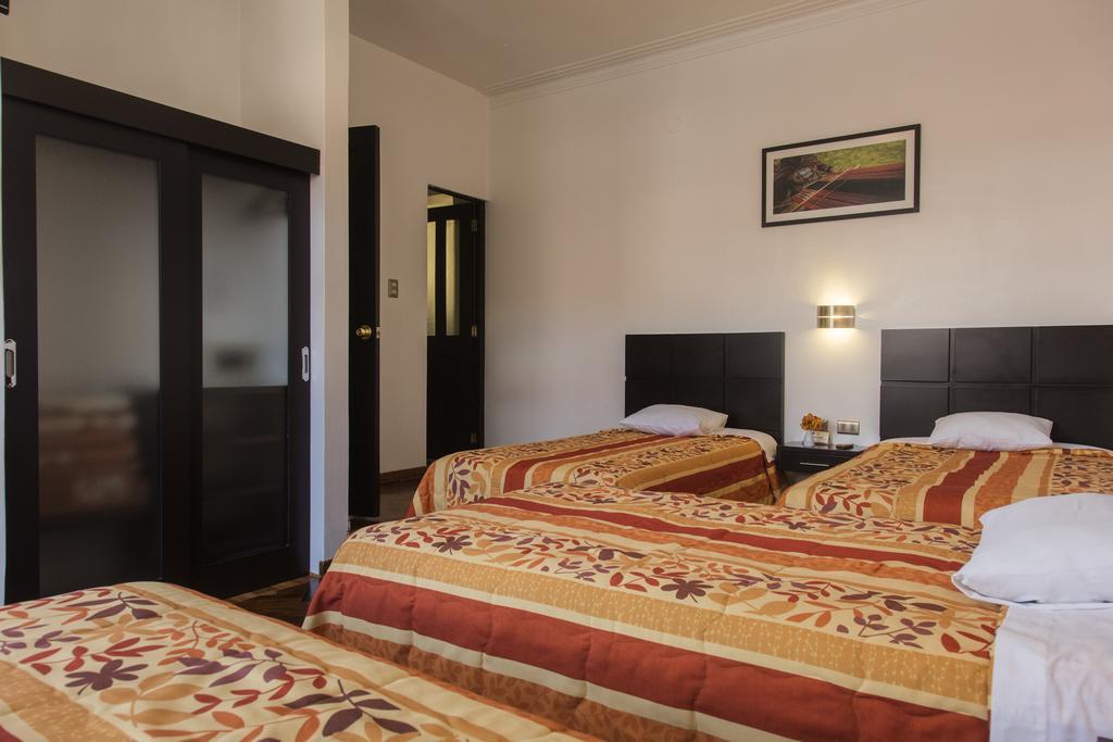 Hostal & Apartments El Triunfo Cuzco Buitenkant foto