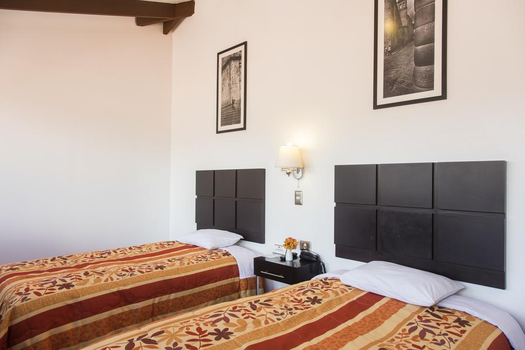 Hostal & Apartments El Triunfo Cuzco Buitenkant foto