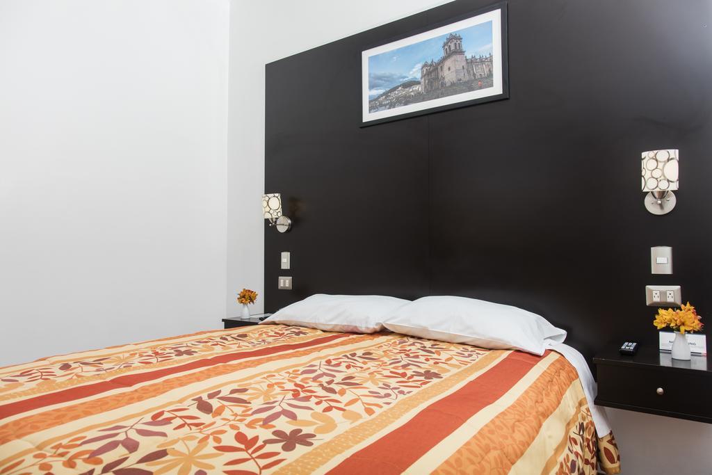 Hostal & Apartments El Triunfo Cuzco Buitenkant foto