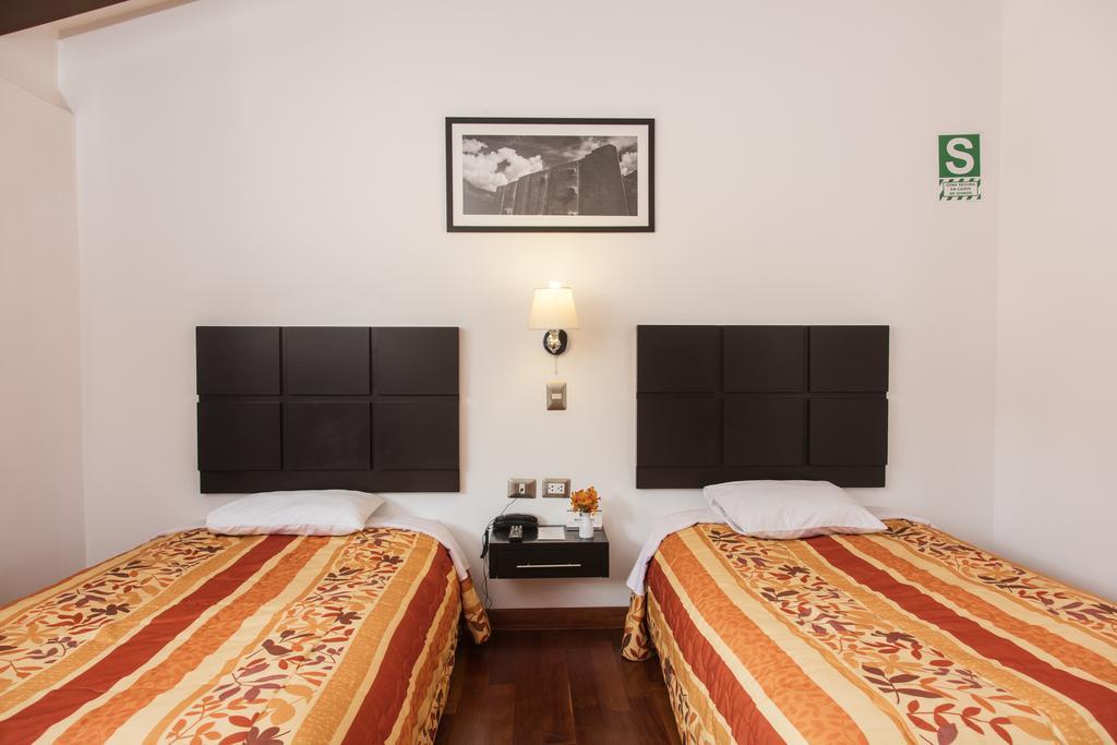 Hostal & Apartments El Triunfo Cuzco Buitenkant foto